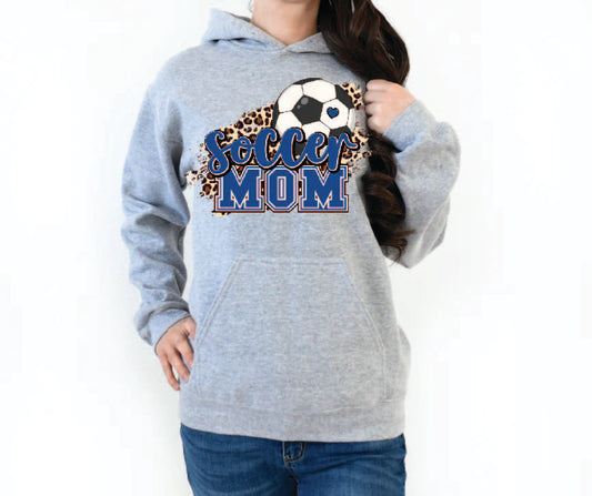 Soccer Mom in Blue with Leopard Background